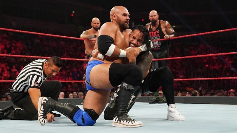 The Revival in a triple-threat match against The Usos and The O.C.
