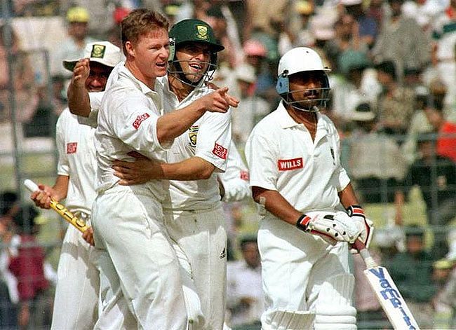 Lance Klusener celebrates his eight-wicket haul.