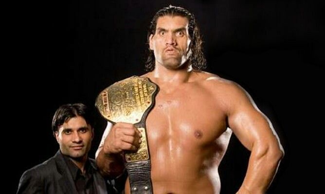 The Great Khali with the WWE World Heavyweight Title