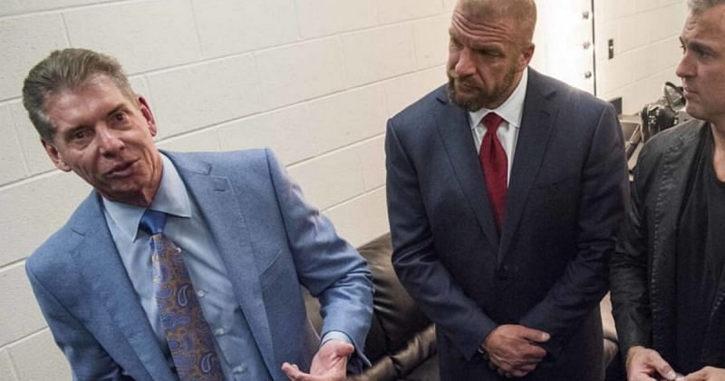 Vince McMahon, Triple H, and Shane McMahon.