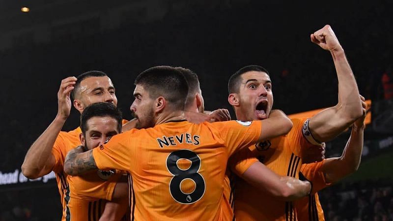Wolves are ecstatic after scoring against Manchester City. 