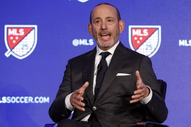 AP Source: MLS cutting pay of top executives, some staff