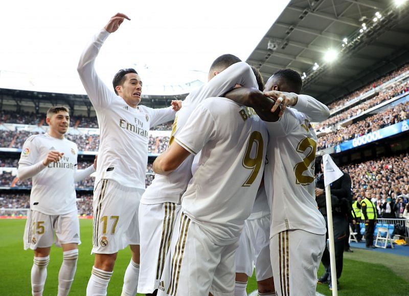 Real Madrid celebrate a goal against Atletico Madrid.