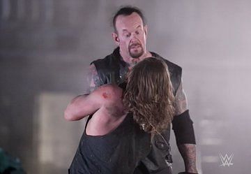 The Undertaker and AJ Styles brawled in a wild Boneyard Match