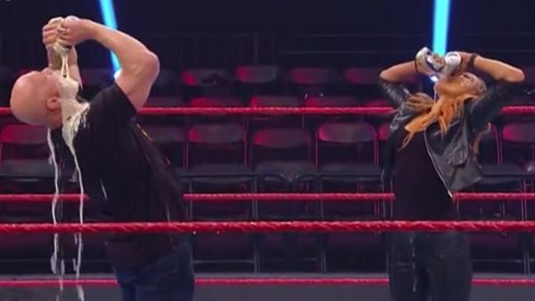 Stone Cold Steve Austin and Becky Lynch in an empty arena