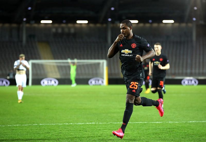 Odion Ighalo exults after scoring a goal against Linz in the Europa League.