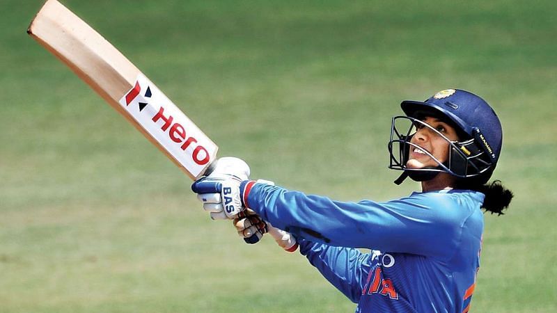 The ever-smiling assassin, Smriti Mandhana, wielding her favourite weapon.