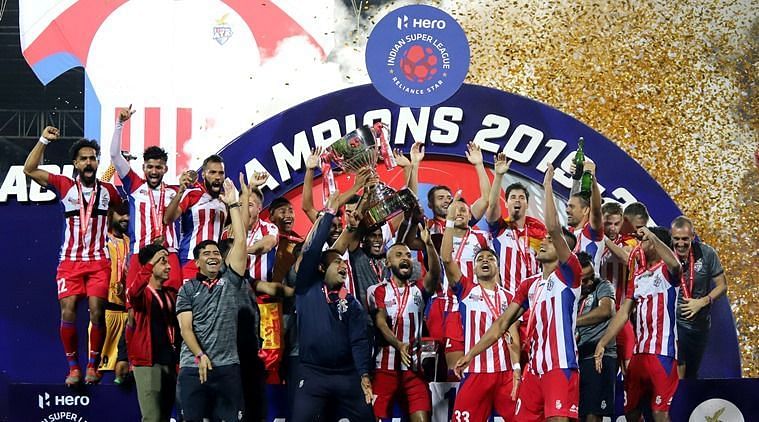ATK players celebrate after clinching the ISL trophy