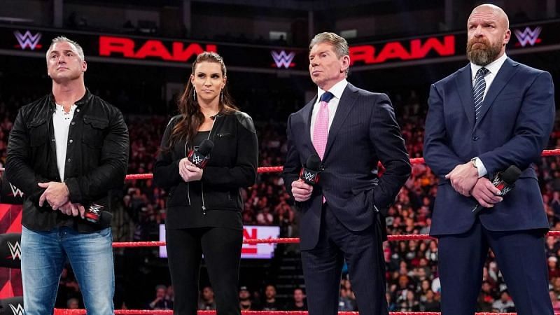 Shane McMahon, Stephanie McMahon, Vince McMahon, and Triple H.
