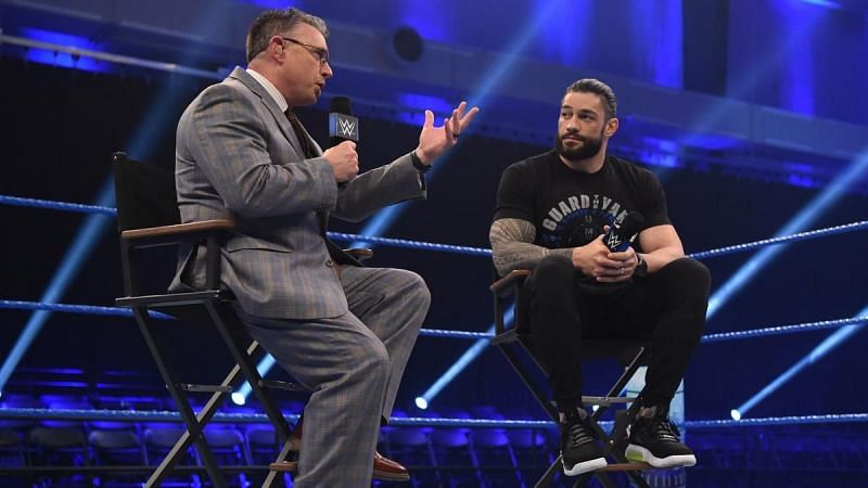 Michael Cole and Roman Reigns on the March 13th episode of SmackDown