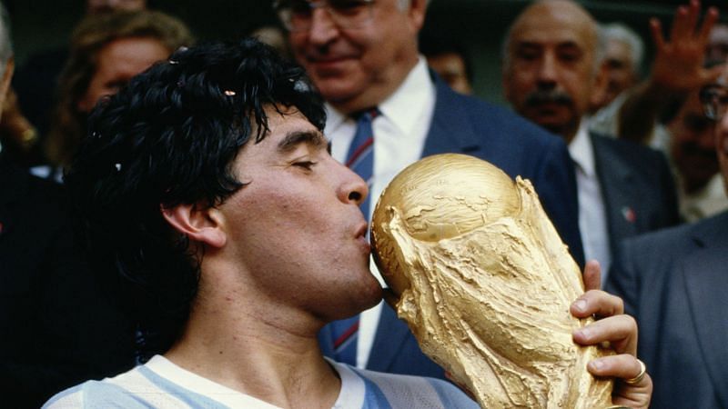 Maradona clutches and kisses the World Cup in a moment of pure joy