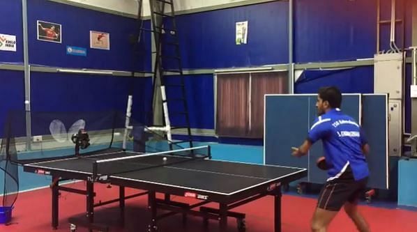 Sathiyan practices with the robot [PC: Sathiyan Instagram]