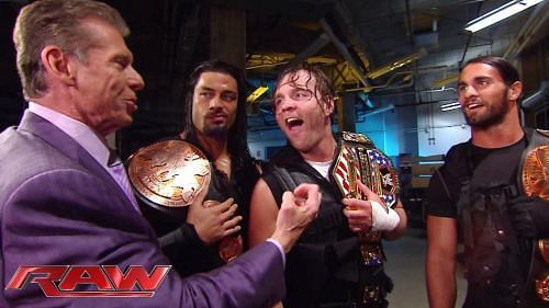 Vince McMahon interacting with Jon Moxley (FKA Dean Ambrose) and The Shield