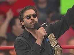 Vince Russo with the WCW World Championship