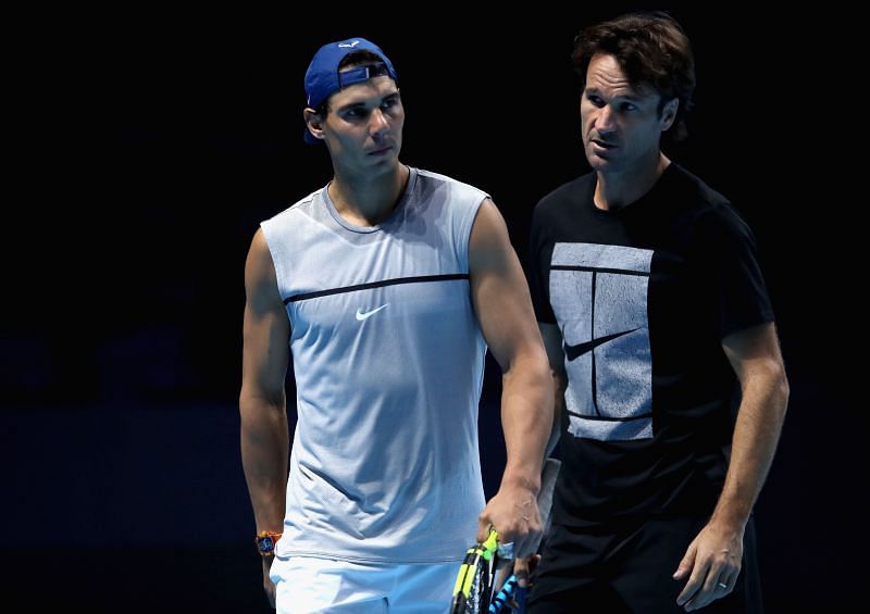 Rafael Nadal (L) and Carlos Moya