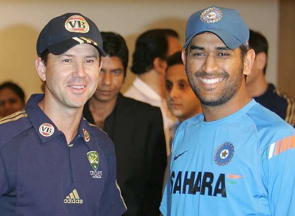 Michael Hussey chose Ricky Ponting (l) and former Indian captain MS Dhoni as the two best captains he has played under