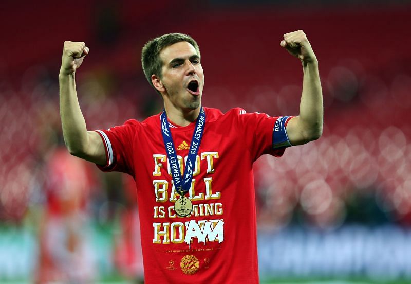 Philipp Lahm rejoices after winning the UCL