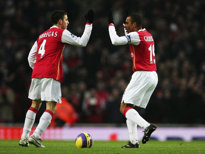 Fabregas celebrating with Gilberto Silva during their time together at Arsenal