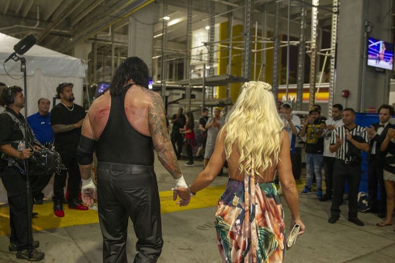 Undertaker and McCool walk hand-in-hand