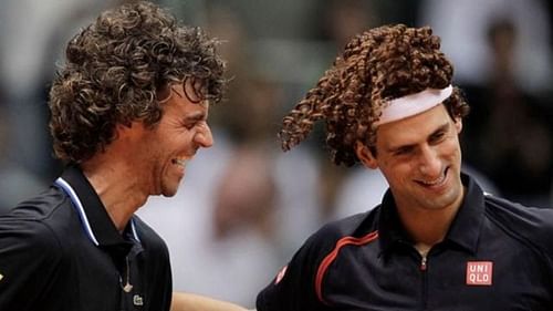 Gustavo Kuerten (left) with Novak Djokovic