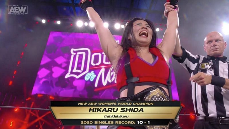 Hikaru Shida celebrates the surprising title change on Saturday night