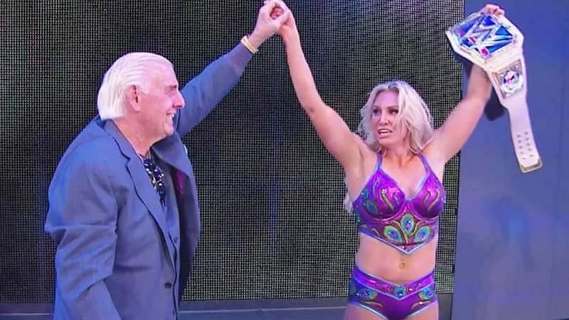 WWE Hall of Famer Ric Flair with his daughter and current WWE Superstar, Charlotte