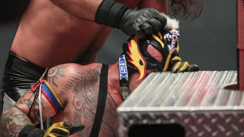 Rey Mysterio suffered an eye injury when Seth Rollins shoved his face into the corner of the steel ring steps (Image: WWE)
