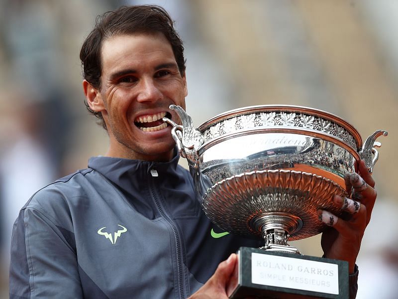 Rafael Nadal savors the Musketeers Cup after winning the 2019 French Open.