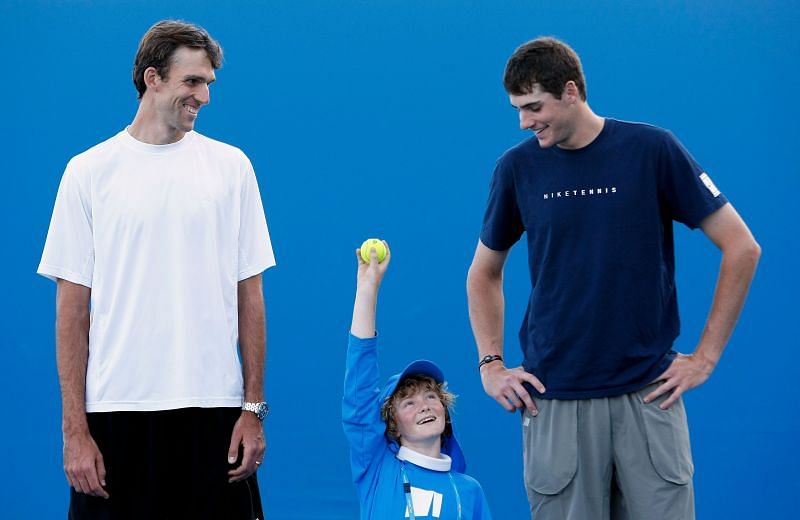 Ivo Karlovic (L) and John Isner (R), the only 2 players who have hit more aces than Roger Federer
