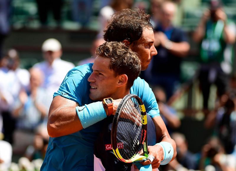 Rafael Nadal and Diego Schwartzman embrace at the net after a tough match at Roland Garros