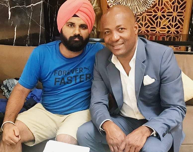 Amar Jeet Singh with Brian Lara