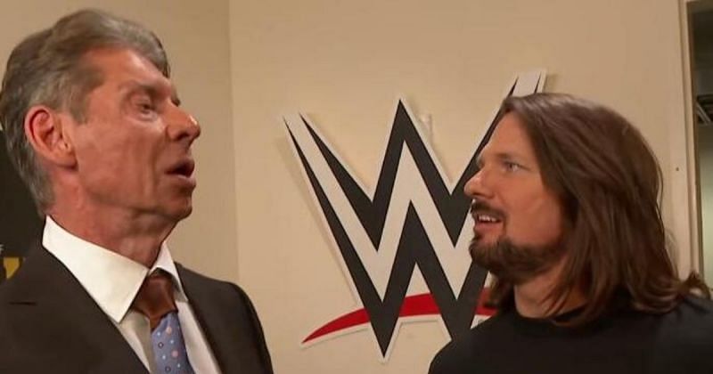 Vince McMahon and AJ Styles.