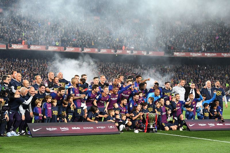 Barcelona players celebrate the 2019 La Liga trophy.