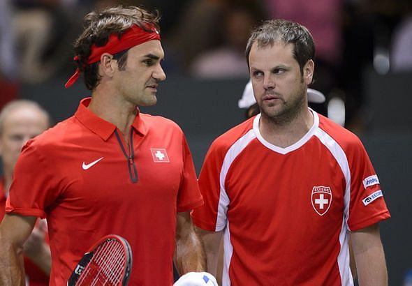 Roger Federer (left) and Severin Luthi