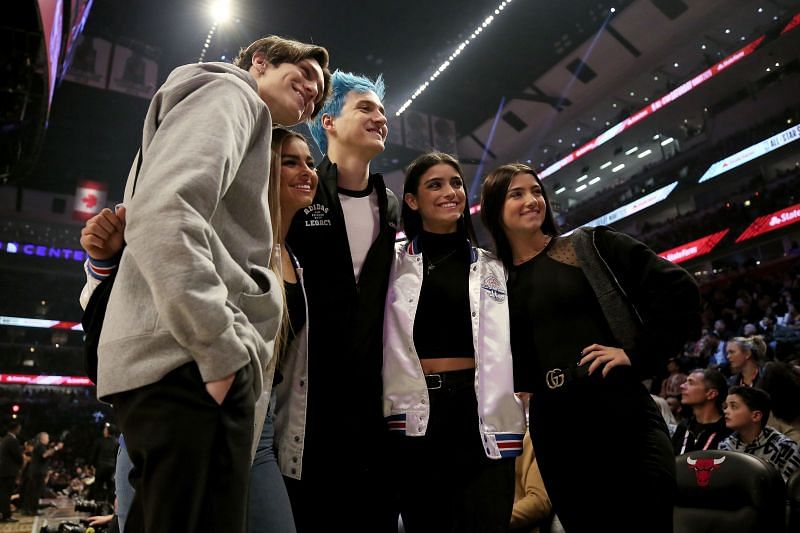 Ninja posing with fans. 