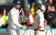 James Anderson shakes hands with Ricky Ponting at the end of play