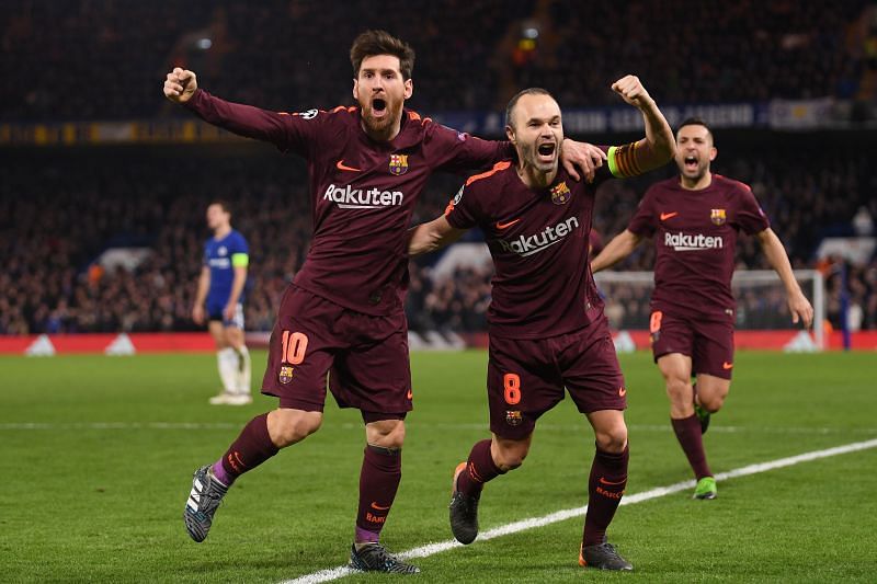 Messi and Andres Iniesta celebrate a goal against Chelsea.