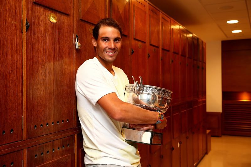 Rafael Nadal with the Coupe des Mousquetaires trophy after winning the French Open for the 12th time