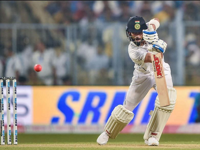 Virat Kohli playing a cover drive in a Test match