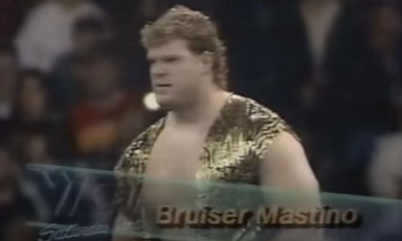 Bruiser Mastino in WCW; he would later go by the name Kane in WWE