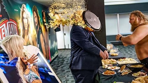 Otis hits Paul Heyman in the face with a pie