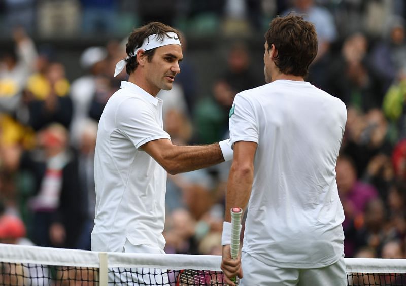 Roger Federer (L) and Guido Pella (R) at Wimbledon 2016