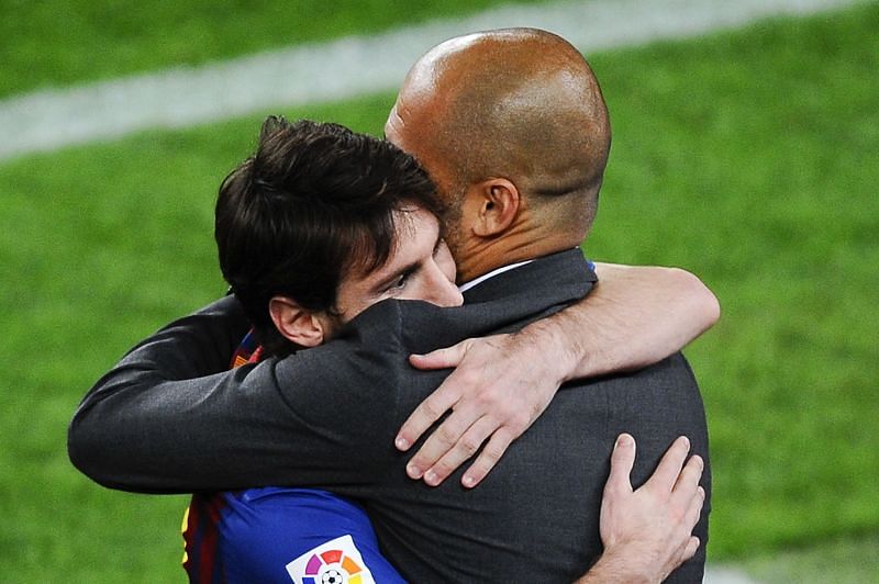 Lionel Messi hugs manager Pep Guardiola