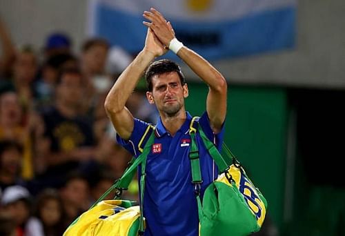 A crestfallen Novak Djokovic acknowledges the crowd after his loss at Rio Olympics