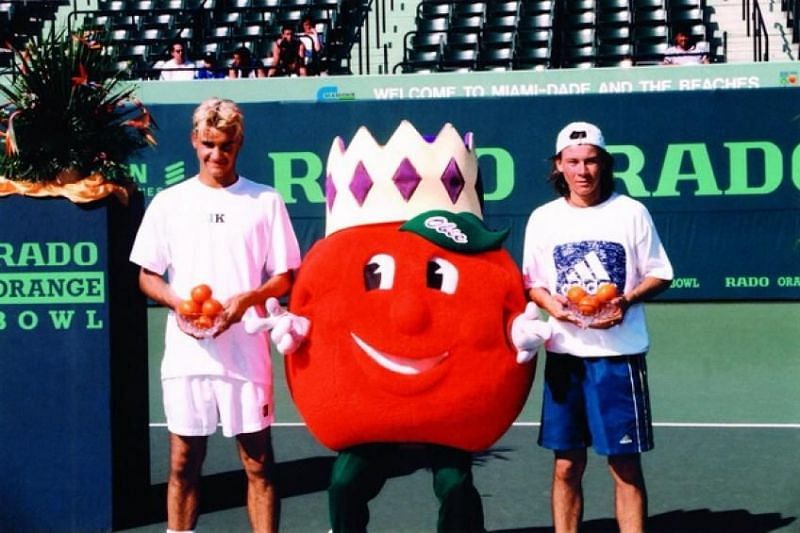 Roger Federer poses with his 1998 Orange Bowl Title