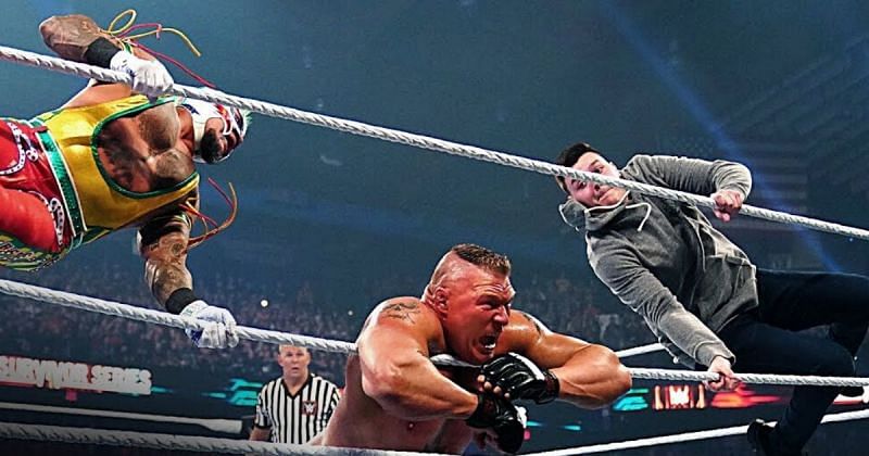 Rey Mysterio and Dominick delivering a double 619 on Brock Lesnar at Survivor Series.