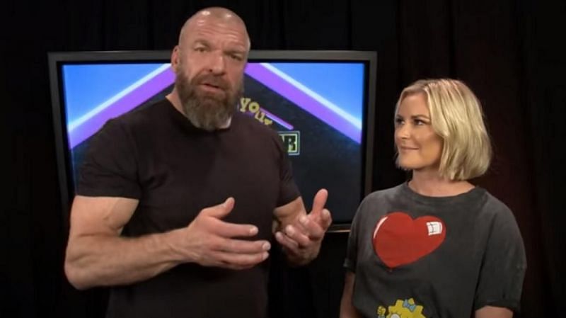 Triple H and Renee Young.