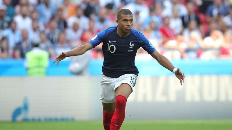 Kylian Mbappe celebrates scoring against Lionel Messi&#039;s Argentina