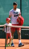 Novak Djokovic's son in the limelight as he steps on the court for a hit