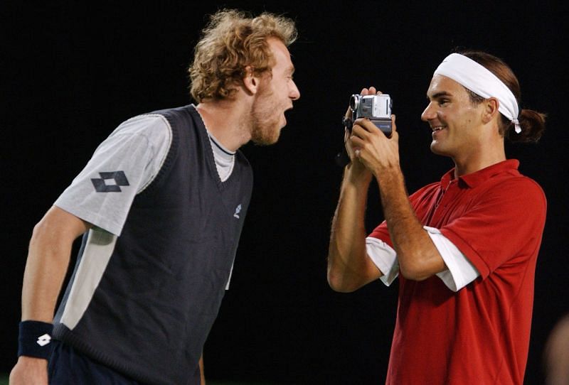 Marc Rosset (L) and Roger Federer (R)